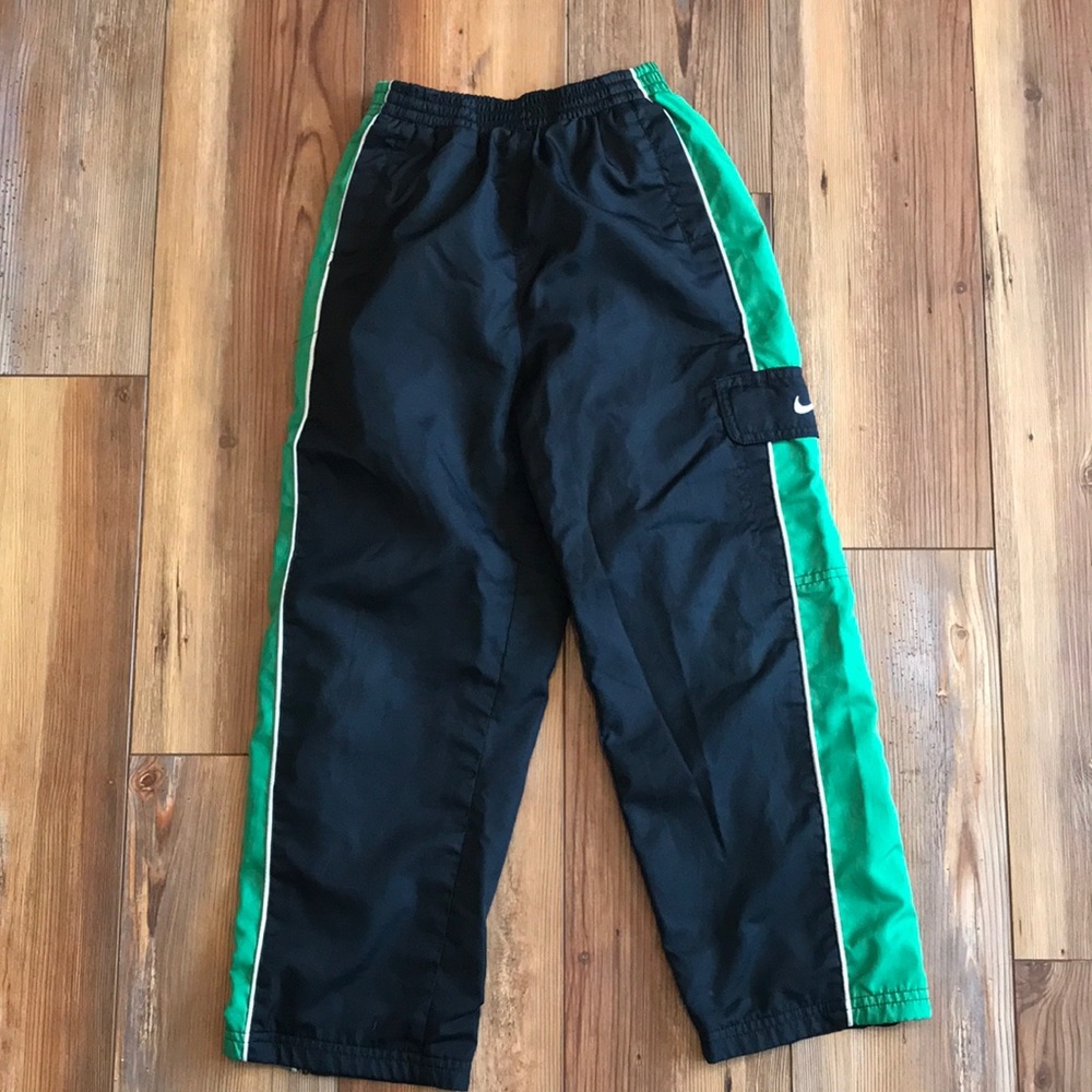 Boys Nike wind pants cargo pocket elastic waist mesh lining size 6